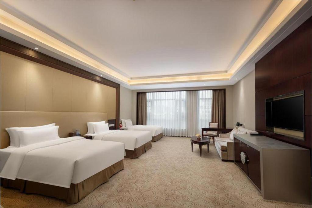 Linyi Blue Horizon International Hotel Yi He Экстерьер фото