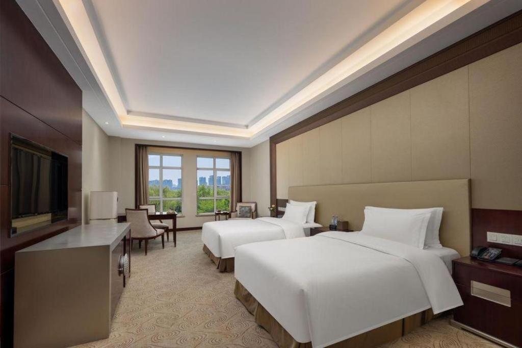 Linyi Blue Horizon International Hotel Yi He Экстерьер фото